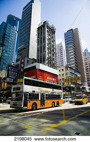 China, Hong Kong, Streets bustle with taxis and busses; Kowloon View Large Photo Image Stock Photography - China, Hong Kong, Streets bustle with taxis and busses; Kowloon. Fotosearch