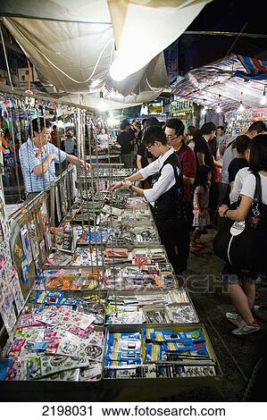 Stock Image - China, Hong Kong, Temple street market; Kowloon. Fotosearch