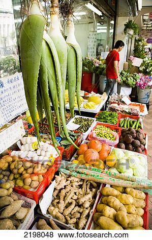 China, Hong Kong, vegetables and aloe vera also on sale; Kowloon, fruit, Flower Market View Large Photo Image Stock Photo - China, Hong Kong, vegetables and aloe vera also on sale; Kowloon, fruit, Flower Market. Fotosearch