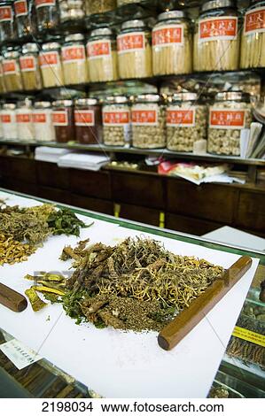 Picture - China, Kowloon. Hong Kong, Chinese medicine shop and dried food shop; Mong Kok. Fotosearch