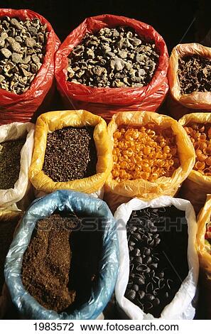 Stock Image - China, Lake Erhai Near Dali, Local Market At Wase, Dried Spices.. Fotosearch