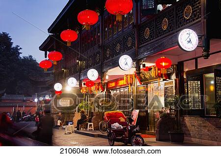 Stock Photo - China, Sichuan, Chengdu, Traditional building with lanterns; Wenshu Yuan. Fotosearch