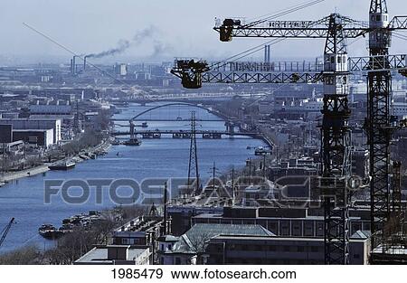 Stock Photo - China, Tianjin, Hai River Flowing Through Industrial District.. Fotosearch