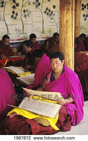 China, Xiahe, Labrange Monastary, Monks Studying, Some Wear Pink, Others Red View Large Photo Image Stock Image - China, Xiahe, Labrange Monastary, Monks Studying, Some Wear Pink, Others Red. Fotosearch