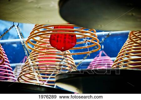 China, Yau Ma Tei K; Hong Kong, Month Long Incense Coils With Prayers And Good Wish Labels View Large Photo Image Stock Photo - China, Yau Ma Tei K; Hong Kong, Month Long Incense Coils With Prayers And Good Wish Labels. Fotosearch