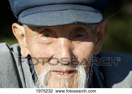 Chine, Beijing, An Elderly Chinese Man Dressed In Mao Era Styled Clothes. View Large Photo Image Stock Image - Chine, Beijing, An Elderly Chinese Man Dressed In Mao Era Styled Clothes.. Fotosearch