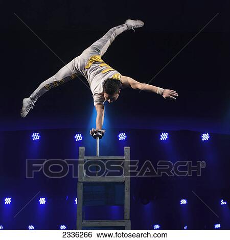 Chinese Acrobatics Show; Beijing, China View Large Photo Image Stock Photograph - Chinese Acrobatics Show; Beijing, China. Fotosearch