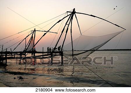 Chinese fishing nets on the Arabian Sea, Malabar Coast at Fort Cochin; Kochi, Kerala, India View Large Photo Image Picture - Chinese fishing nets on the Arabian Sea, Malabar Coast at Fort Cochin; Kochi, Kerala, India. Fotosearch