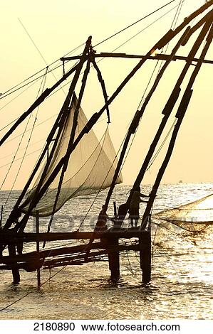 Stock Image - Chinese fishing nets on the Arabian Sea, Malabar Coast at Fort Cochin; Kochi, Kerala, India. Fotosearch