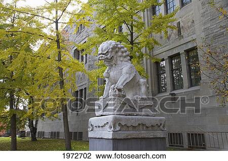 Stock Image - Chinese Lion In Front Of The Royal Ontario Museum, Toronto, Ontario, Canada. Fotosearch