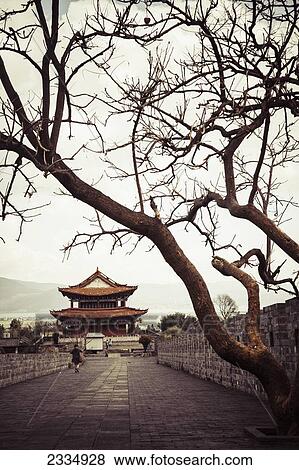 Chinese Pagoda Sits Atop Ancient Dali City Wall; Dali City, Yunnan, China View Large Photo Image Stock Photo - Chinese Pagoda Sits Atop Ancient Dali City Wall; Dali City, Yunnan, China. Fotosearch