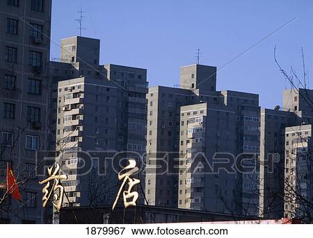 Stock Photo - Chinese Script And Blocks Of Flats On Outskirts Of Beijing. Fotosearch