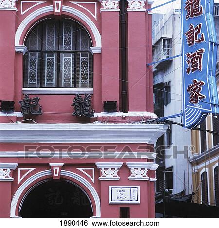 Stock Photograph - Chinese Sign And Portuguese Building. Fotosearch