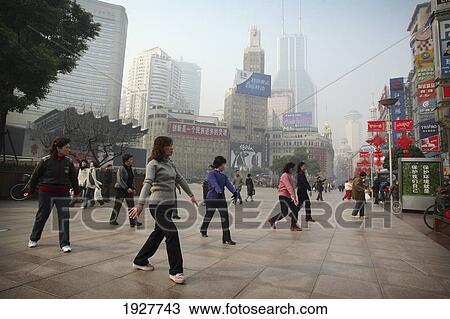 Chinese Women Doing Tai Chi Exercises In A Shopping Precinct, Shanghai, China View Large Photo Image Stock Image - Chinese Women Doing Tai Chi Exercises In A Shopping Precinct, Shanghai, China. Fotosearch