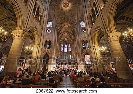 Choir Performing During A Mass In Notre Dame De Paris Cathedral, Paris, France View Large Photo Image Stock Image - Choir Performing During A Mass In Notre Dame De Paris Cathedral, Paris, France. Fotosearch