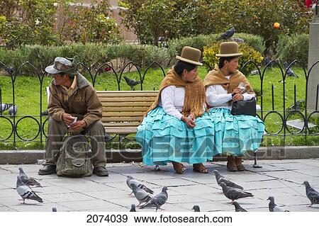 Cholitas Sitting On A Bench In Plaza Murillo, La Paz, Bolivia View Large Photo Image Stock Photo - Cholitas Sitting On A Bench In Plaza Murillo, La Paz, Bolivia. Fotosearch