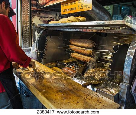 Chopping food at a food cart; Istanbul, Turkey View Large Photo Image Stock Photo - Chopping food at a food cart; Istanbul, Turkey. Fotosearch