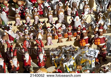 Stock Image - Christmas Decorations For Sale In A Christmas Market In Hyde Park, Winter Wonderland, London, Uk. Fotosearch