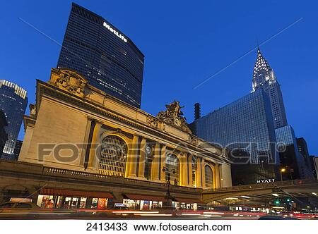 Stock Image - Chrysler Building and Grand Central Station on 42nd Street, Manhattan; New York City, New York, United States of America. Fotosearch
