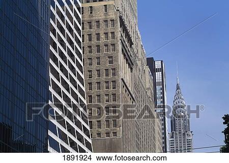 Chrysler & Surrounding Buildings View Large Photo Image Picture - Chrysler & Surrounding Buildings. Fotosearch