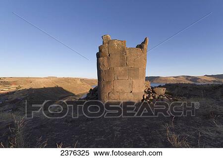 Chullpa (ancient Colla funerary tower) overlooking Lake Umayo, Sillustani, Puno, Peru View Large Photo Image Stock Photography - Chullpa (ancient Colla funerary tower) overlooking Lake Umayo, Sillustani, Puno, Peru. Fotosearch