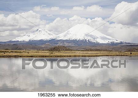 Stock Photography - Chungara Lake And Nevados De Payachata (Pomerape Volcano And Parinacota Volcano), Lauca National Park, Arica And Parinacota Region, Chile. Fotosearch