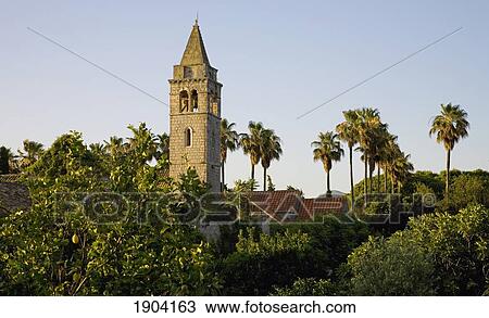 Church Amongst Trees At Sunset, Lopud, Croatia View Large Photo Image Stock Image - Church Amongst Trees At Sunset, Lopud, Croatia. Fotosearch