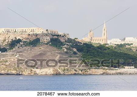 Church And Harbour, Mgarr, Gozo Island, Malta View Large Photo Image Stock Photo - Church And Harbour, Mgarr, Gozo Island, Malta. Fotosearch