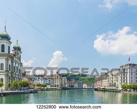 Church and residential buildings along River Reuss; Lucerne, Switzerland View Large Photo Image Stock Image - Church and residential buildings along River Reuss; Lucerne, Switzerland. Fotosearch