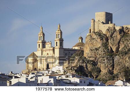 Stock Photo - Church Of Our Lady Of The Incarnation And A Moorish Castle; Olvera Cadiz Andalusia Spain. Fotosearch