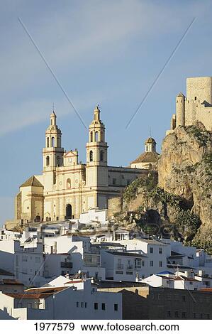 Stock Photo - Church Of Our Lady Of The Incarnation And A Moorish Castle; Olvera Cadiz Andalusia Spain. Fotosearch