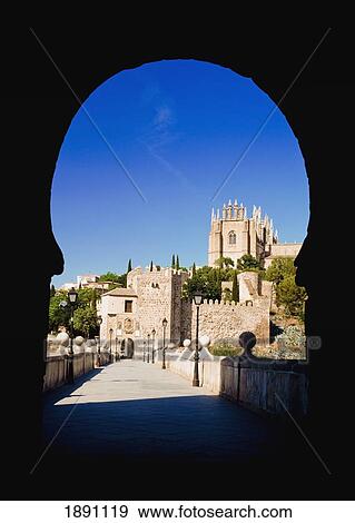 Stock Photo - Church Of San Juan De Los Reyes Viewed Along Puente De San Martin, Toledo, Spain. Fotosearch