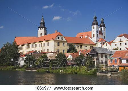 Stock Photo - Church Of St. James The Elderly And Ulicky Pond, Telc, Czech Republic. Fotosearch
