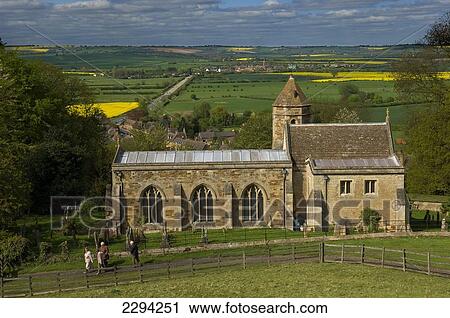 Stock Image - Church of St Leonard and surrounding countryside, Rockingham Castle; Leicestershire, England. Fotosearch