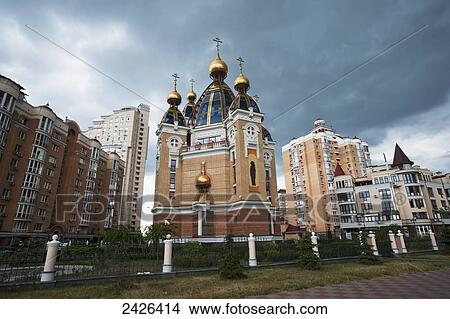 Picture - Church with ornate rooftop surrounded by residential buildings; Kiev, Ukraine. Fotosearch