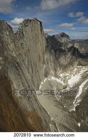 Stock Image - Cirque Of Unclimbables, A Circle Of Granite Walls Which Draws Rock Climbers From All Over The World. Mount Proboscis In Background, Nahanni National Park, Northwest Territories. Fotosearch
