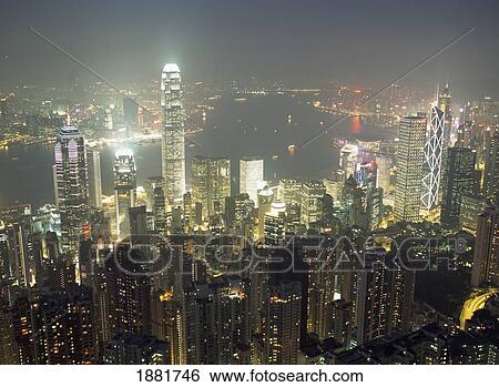 Stock Photograph - City Illuminated At Night, Hong Kong. Fotosearch