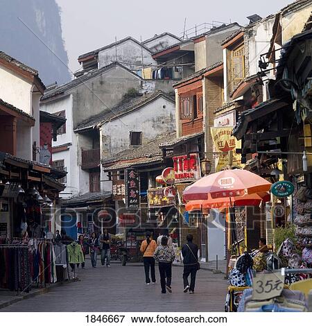 Stock Photo - City Life In Small Asian Town. Fotosearch