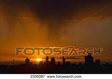 City Of London Skyline With Setting Sun; London, England, Uk View Large Photo Image Stock Photo - City Of London Skyline With Setting Sun; London, England, Uk. Fotosearch