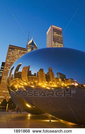 Stock Photo - City Reflected In Cloud Gate In Millennium Park, Dusk. Fotosearch