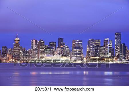 Stock Image - City Skyline And Canada Place At Night; Vancouver British Columbia Canada. Fotosearch