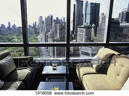 Stock Photo - City Skyline And Central Park From Bar Of Mandarin Oriental Hotel; New York City, New York, Usa. Fotosearch