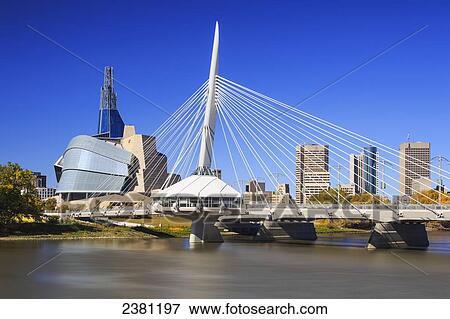 Stock Photo - City skyline with Esplanade Riel bridge and Canadian Museum for Human Rights; Winnipeg, Manitoba, Canada. Fotosearch
