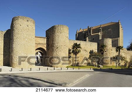 Stock Photo - City Walls To The South With The Parroquia Del Espiritu At The Right Hand Side; Ronda Malaga Spain. Fotosearch