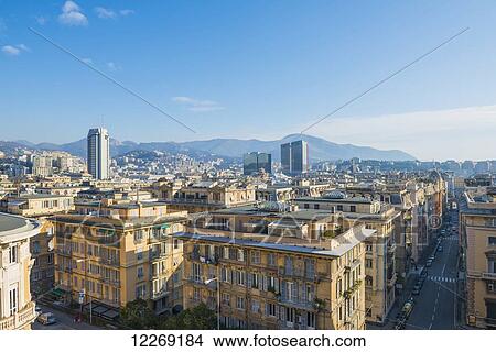 Cityscape and mountains in the distance; Genoa, Liguria, Italy View Large Photo Image Picture - Cityscape and mountains in the distance; Genoa, Liguria, Italy. Fotosearch