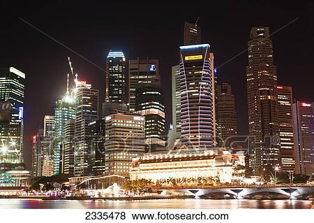 Stock Photo - Cityscape At Night; Singapore City, Singapore. Fotosearch
