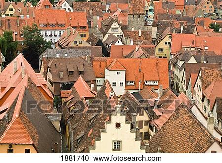 Stock Image - Cityscape, House Rooftops, Elevated View. Fotosearch