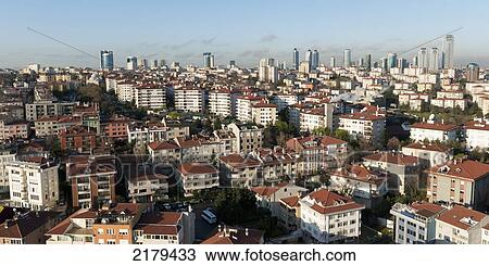 Cityscape Of Residential Buildings And Skyscrapers Against A Blue Sky; Istanbul Turkey View Large Photo Image Stock Image - Cityscape Of Residential Buildings And Skyscrapers Against A Blue Sky; Istanbul Turkey. Fotosearch