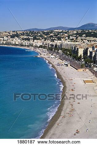Stock Photo - Cityscape With People On Beach In Foreground, Aerial View. Fotosearch
