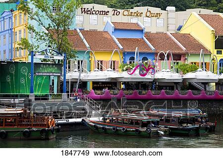 Stock Photo - Clarke Quay, Singapore, Southeast Asia; Waterfront Shopping Mall. Fotosearch